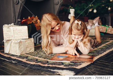 Mother with cute daughter at home 70963127