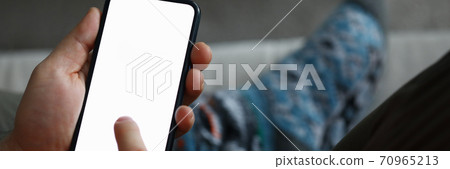 Man surfing internet via gadget 70965213