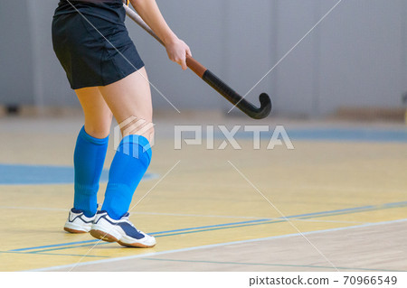 Undefined female indoor hockey player with stick Undefined female indoor hockey player with stick 70966549