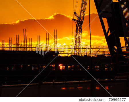 Sunset scene of construction site 70969277