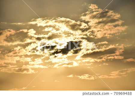 Interestingly shaped sunrise clouds, dramatic sunrise clouds, artistic sunrise clouds 70969488