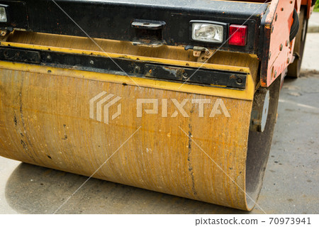 Asphalt rolling machine. Asphalt rolling machine. 70973941