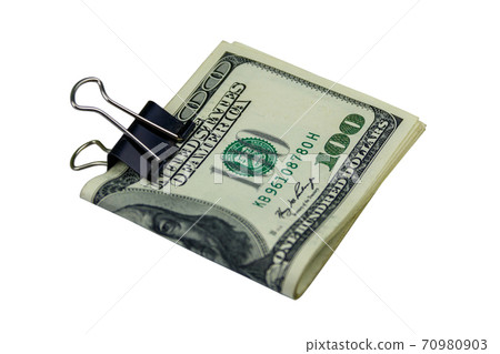Bundle of bills of american one hundred dollars in paper clip isolated on white background Bundle of bills of american one hundred dollars in paper clip isolated on white background 70980903