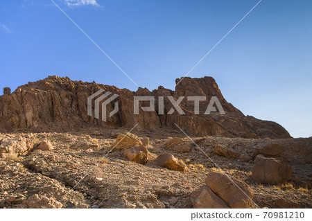 Rocky desert peaks of the Atlas mountains in the late morning 70981210