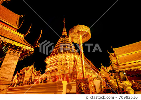 Wat Phra That Doi Suthep. Buddhist temple in Chiang Mai, Thailand. Tourist travel destinations in the north of Thailand. Wat Phra That Doi Suthep is landmark in Chiang Mai. Golden temple in the night. 70982510