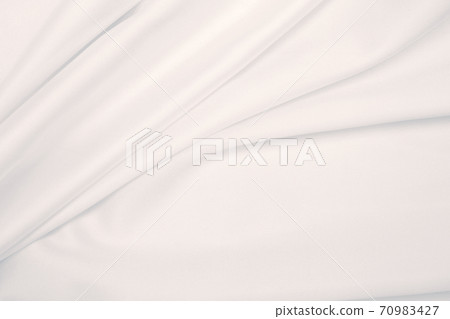 Smooth elegant grey silk or satin luxury cloth as wedding background. Luxurious background design Smooth elegant grey silk or satin luxury cloth as wedding background. Luxurious background design 70983427