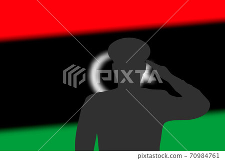 Solder silhouette on blur background with Libya flag. 70984761