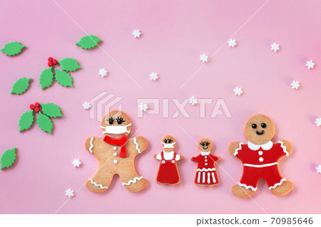Masked gingerbread man cookies Christmas background 70985646