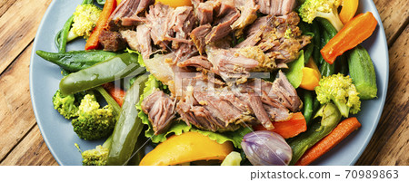Stewed meat in vegetables 70989863