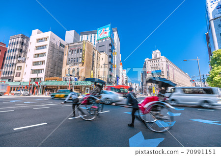 Tokyo cityscape of Japan View of rickshaws and Asakusa station that shines in the blue sky Tokyo cityscape of Japan View of rickshaws and Asakusa station that shines in the blue sky 70991151