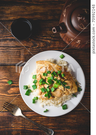 Japanese rice dish with chicken, egg, sliced scallion 70992148