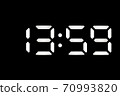 Real white led digital clock on black background 70993820