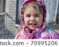 Close up Portrait of cute little girl in winter 70995206