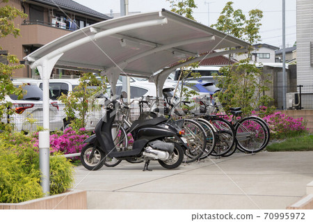 Bicycle parking lot in a residential area 70995972