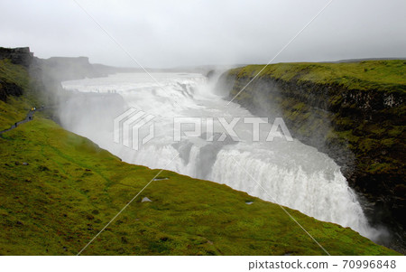 Gullfoss Waterfall, Iceland: The Gullfoss Waterfall (Golden Falls) is part of the Golden Circle Tour of Iceland from Reykjavik. Gullfoss Waterfall (Golden Falls) is a tourist attraction in Iceland. Gullfoss Waterfall, Iceland: The Gullfoss Waterfall (Golden Falls) is part of the Golden Circle Tour of Iceland from Reykjavik. Gullfoss Waterfall (Golden Falls) is a tourist attraction in Iceland. 70996848