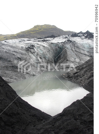 Solheimajokull Glacier, Iceland: Solheimajokull Glacier is one of the most accessible in Iceland and is part most South Coast tours of the island. Glacier tour from Reykjavik in Iceland. Solheimajokull Glacier, Iceland: Solheimajokull Glacier is one of the most accessible in Iceland and is part most South Coast tours of the island. Glacier tour from Reykjavik in Iceland. 70996942