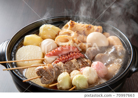Various oden stewed in a clay pot 70997663