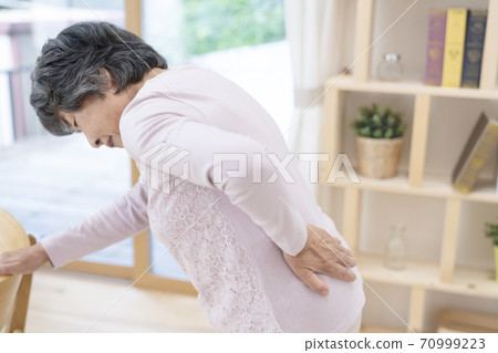 Senior woman with a backache Body parts parts cut 70999223