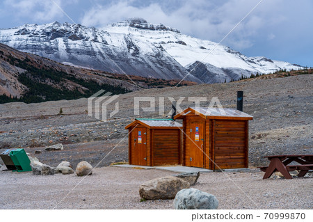 A public lavatory in the toe of the Athabasca Glacier Trailhead. Columbia Icefield, Jasper National Park, Alberta, Canada. 70999870