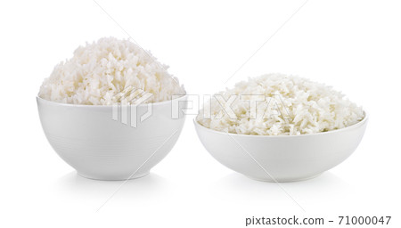 Rice in white cup on white background Rice in white cup on white background 71000047