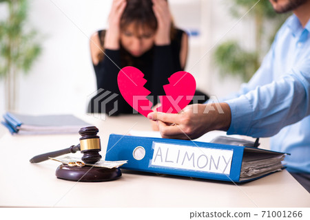 Young couple divorcing in alimony concept 71001266