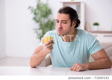 Young man suffering from toothache Young man suffering from toothache 71004181