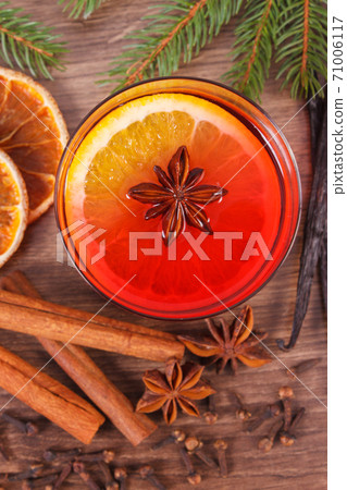 Mulled wine for christmas or winter evening with spices and spruce branches 71006117