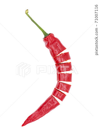 Red chilli, sliced. Isolated on white Red chilli, sliced. Isolated on white 71007116