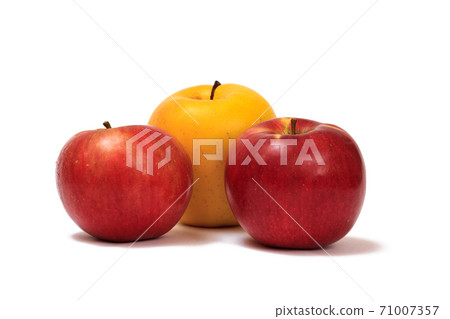 Three ripe apples on a white isolated background. Three ripe apples on a white isolated background. 71007357