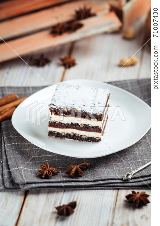 Brownie dessert with chocolate cakes with nuts 71007430