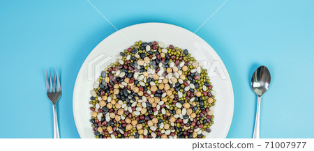 Organic mixed Beans; Green, Black, Red, White and Chick pea on plate 71007977