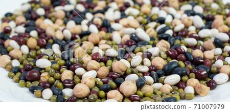Organic mixed Beans; Green, Black, Red, White and Chick pea on plate Organic mixed Beans; Green, Black, Red, White and Chick pea on plate 71007979