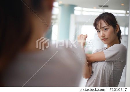 Women stretching Women stretching 71010847