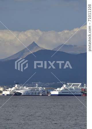 Taking a distant view of Hakodate Port Ferry Terminal and Mt. Komagatake in Hakodate City, Hokkaido in autumn 71011108