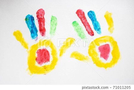 multicolored prints of hands, children's creativity, drawing 71011205