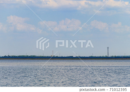 Solar power station on a bank of lake. Renewable energy Solar power station on a bank of lake. Renewable energy 71012395