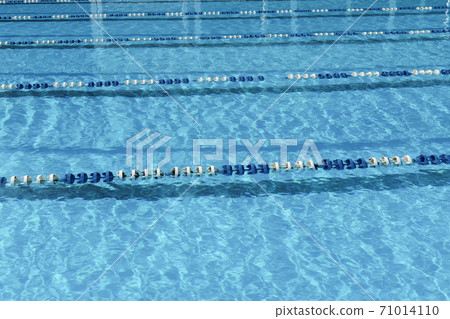 sunny outdoor swimming pool with pathes. sunny outdoor swimming pool with pathes. 71014110