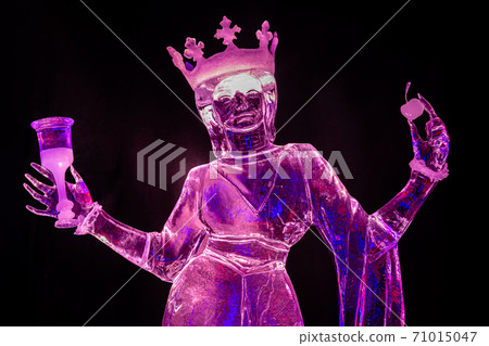 Pink sculpture of a queen with a crown made of ice, National Ice sculpture festival Zwolle, the Netherlands 2019-2020 71015047