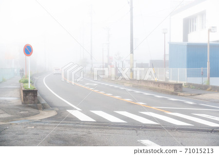 A photo of the scenery surrounded by fog. Image of hesitation. A photo of the scenery surrounded by fog. Image of hesitation. 71015213
