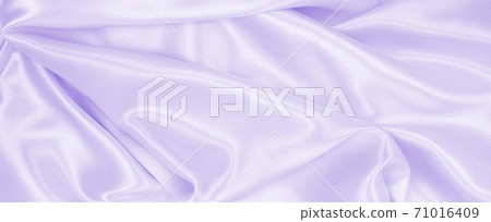 Smooth elegant lilac silk or satin texture as wedding background. Luxurious valentine day background design Smooth elegant lilac silk or satin texture as wedding background. Luxurious valentine day background design 71016409