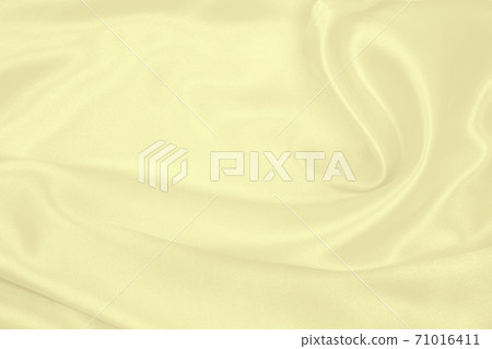 Smooth elegant golden silk or satin luxury cloth texture as wedding background. Luxurious background design. In Sepia toned. Retro style Smooth elegant golden silk or satin luxury cloth texture as wedding background. Luxurious background design. In Sepia toned. Retro style 71016411