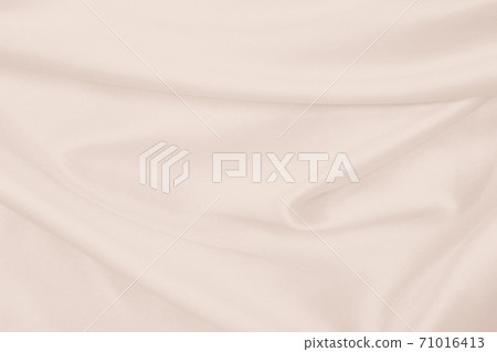 Smooth elegant golden silk or satin luxury cloth texture as wedding background. Luxurious background design. In Sepia toned. Retro style Smooth elegant golden silk or satin luxury cloth texture as wedding background. Luxurious background design. In Sepia toned. Retro style 71016413
