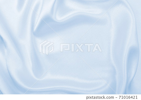 Smooth elegant blue silk or satin luxury cloth texture as abstract background. Luxurious background design 71016421