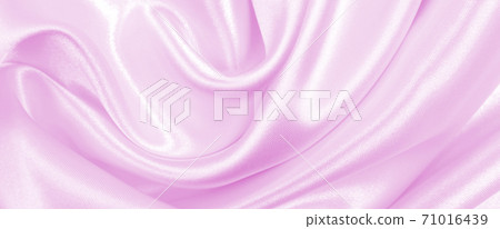Smooth elegant pink silk or satin texture as wedding background. Luxurious background design Smooth elegant pink silk or satin texture as wedding background. Luxurious background design 71016439