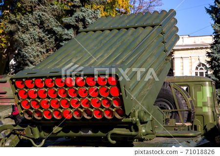 Multiple launch rocket systems rear view, military vehicle of the Ukrainian army in the city. 71018826