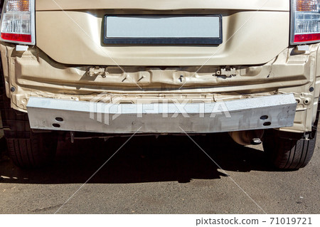 Close-up of a car without a bumper, rear view of a car after an incident. Close-up of a car without a bumper, rear view of a car after an incident. 71019721