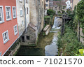 Cuissance River in the historical village of Arbois, Jura, France 71021570