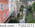 Cuissance River in the historical village of Arbois, Jura, France 71021571
