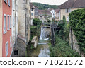 Cuissance River in the historical village of Arbois, Jura, France 71021572