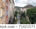 Cuissance River in the historical village of Arbois, Jura, France 71021573